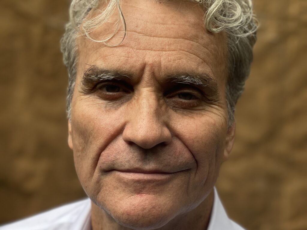 Junod_Headshot©-Lee-Crum-scaled-aspect-ratio-4-3